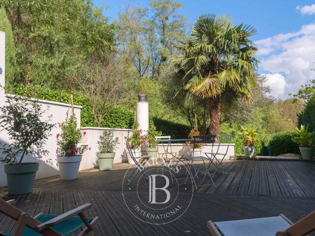 Collonges-au-Mont d'Or - Appartement de  99 m² - 2 Chambres - Jardin environ 300m² — photo du bien