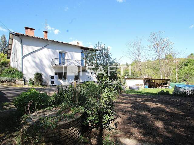 Grande maison familiale économe avec vaste espace idéal pour artisan, collectionneur ou stockage — photo du bien