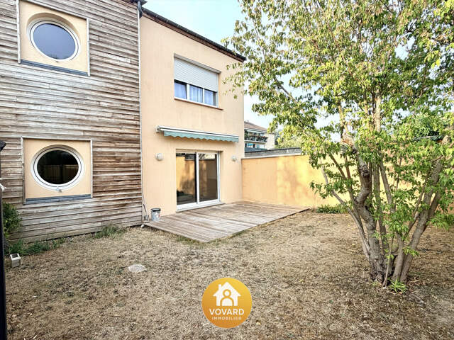 Appartement F3 en Rez de jardin - en plein centre ville - — photo du bien