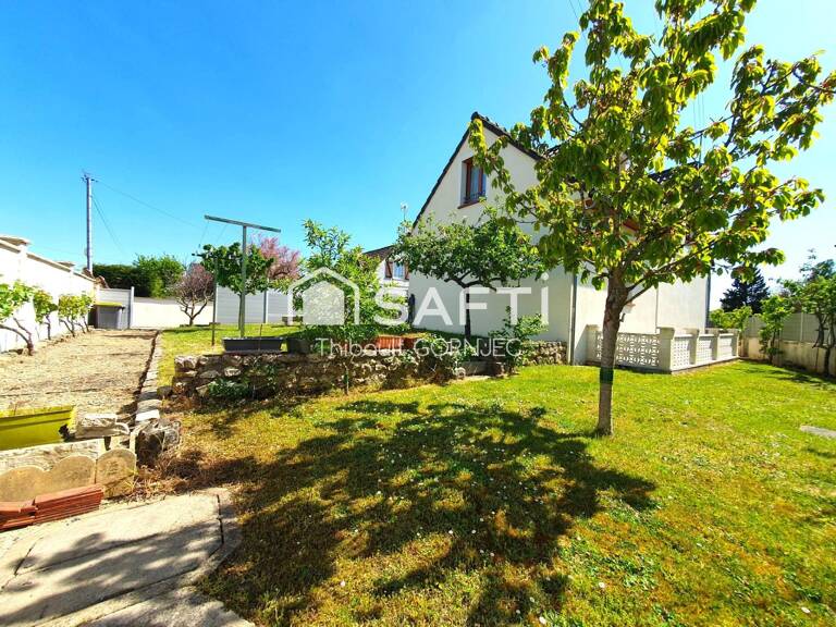 Maison familiale 120 m², 5 chambres, grand jardin avec arbres fruitiers, double garage avec fosse. — photo 1