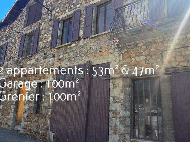 Maison composée de 2 appartements (57 et 43m²) et d'un grand garage de 100m² — photo du bien