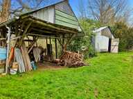 Au cœur de la nature, propriété d’exception de 18 000 M2 avec étang privé, 2 granges-maison chaleureuse de 133 m², 3 chambres, cheminée et poêle : un havre de paix à LA FERTE SOUS JOUARRE (77) — photo 2