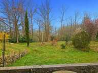 Au cœur de la nature, propriété d’exception de 18 000 M2 avec étang privé, 2 granges-maison chaleureuse de 133 m², 3 chambres, cheminée et poêle : un havre de paix à LA FERTE SOUS JOUARRE (77) — photo 4