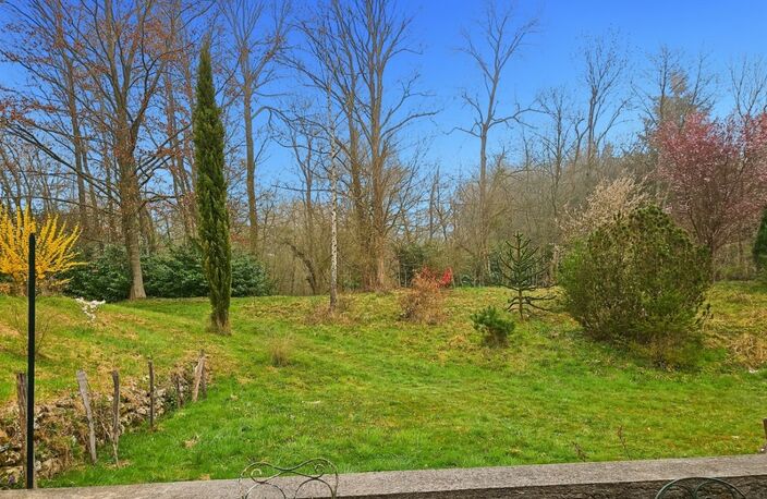 Au cœur de la nature, propriété d’exception de 18 000 M2 avec étang privé, 2 granges-maison chaleureuse de 133 m², 3 chambres, cheminée et poêle : un havre de paix à LA FERTE SOUS JOUARRE (77) — photo 4