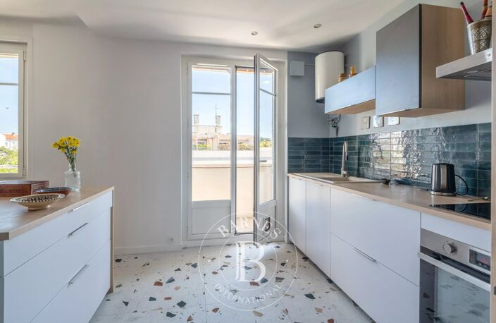 Lyon 4ème - Appartement de 103,54 m² - 3 chambres - Balcon filant - garage — photo 5