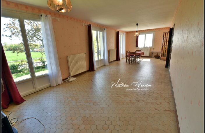 Maison familiale 4 chambres avec vie de plain-pied, sous-sol total et jardin de 1 380 m² — photo 3