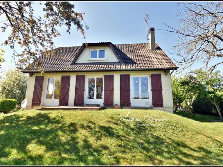 Maison familiale 4 chambres avec vie de plain-pied, sous-sol total et jardin de 1 380 m² — photo 1