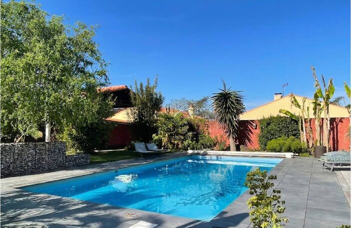 MAISON FAMILIALE DE STANDING - PLAIN-PIED - DPE B - PISCINE CHAUFFÉE - STUDIO INDÉPENDANT — photo 2