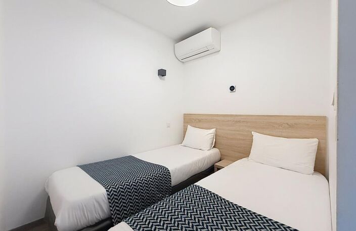 Appartement T2 bis – Résidence de tourisme – Quartier La Ville en Bois — photo 3