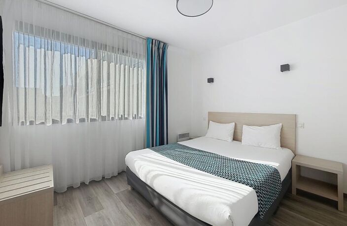 Appartement T2 bis – Résidence de tourisme – Quartier La Ville en Bois — photo 4