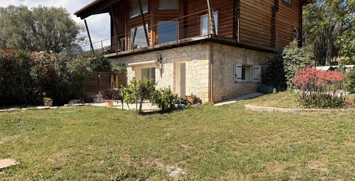 EXCLUSIVITÉ – APPARTEMENT EN REZ-DE-CHAUSSÉE AVEC JARDIN ET GARAGE — photo 1