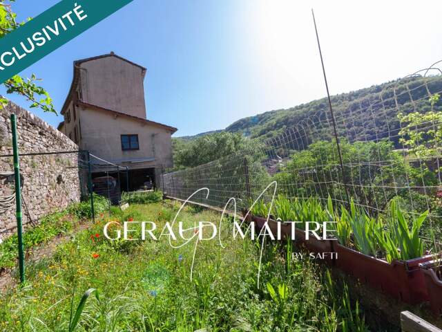 Maison 5 ch avec jardin et garage, vue sur la rivière. — photo du bien