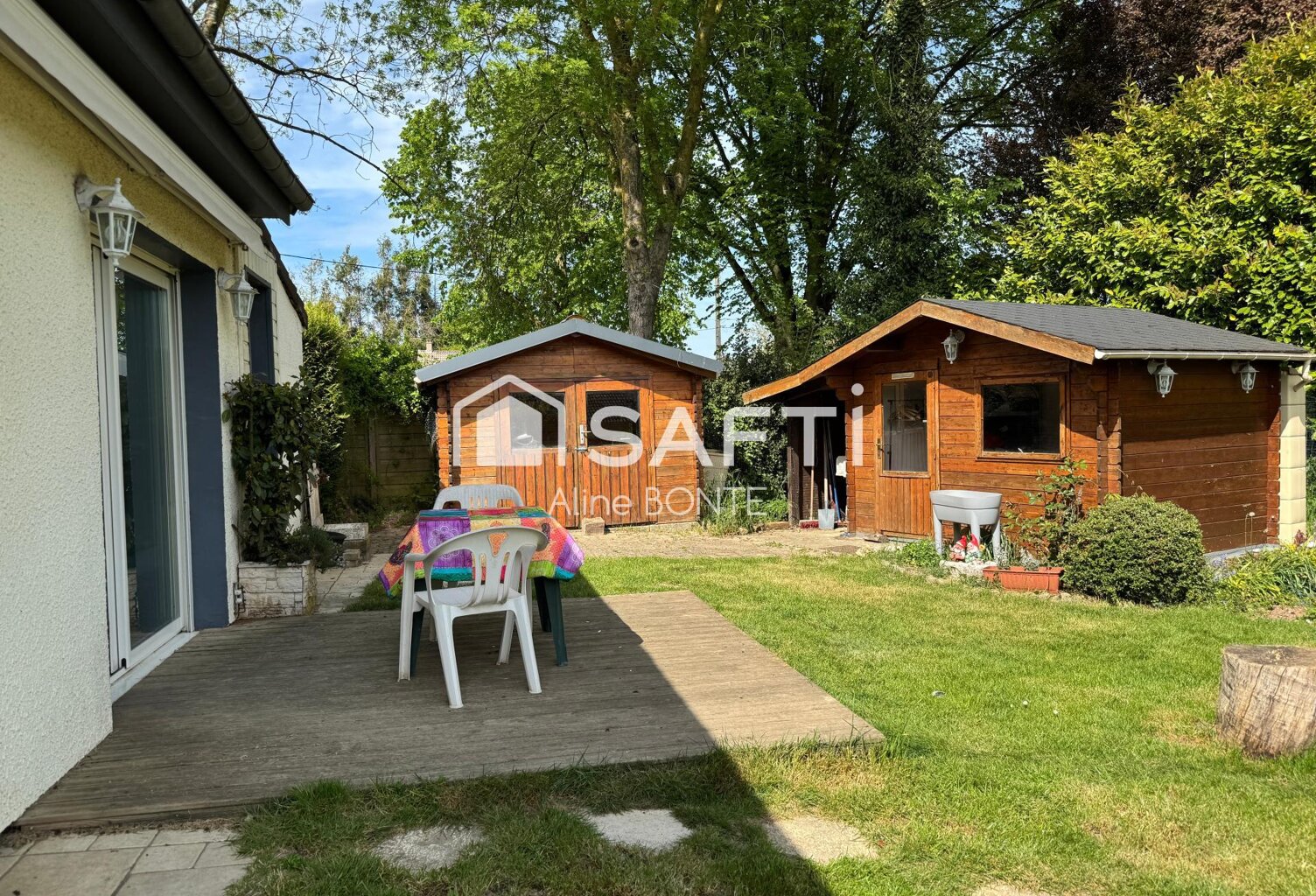 Maison de plain-pied avec garage — photo 1