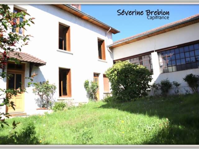 Ensemble immobilier avec une maison, 2 appartements loués, 2 garages, 3 ateliers à Chabreloche — photo du bien
