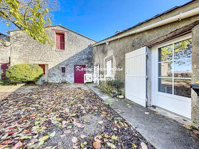 Maison en pierre avec jardin — photo du bien