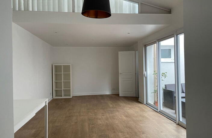 Duplex avec local commercial, Boulevard du Lycée à Vanves (92170). — photo 2