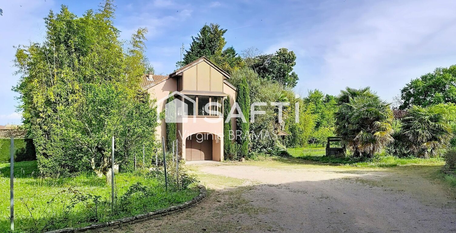 Maison avec sous-sol complet et grand terrain arboré — photo 1