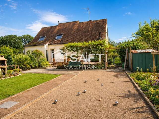 Un jardin de 2 500 m², quatre chambres et un cadre de vie exceptionnel Il ne manque plus que vous ! — photo du bien