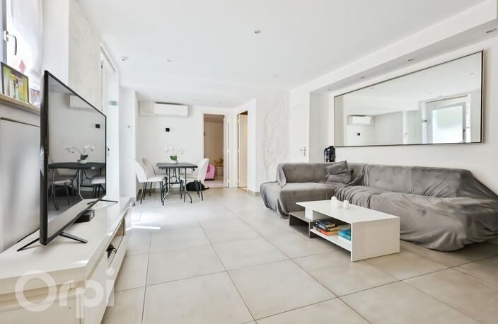 APPARTEMENT 4 PIÈCES - COUR PRIVATIVE - STATIONNEMENT — photo 3