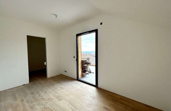 À vendre – Appartement T4 en attique de 100,20 m² avec vaste terrasse de 125,90 m² à La Roche-sur-Foron (74) — photo 4