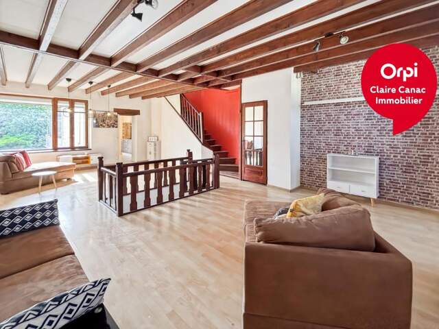   Maison de ville avec garage, jardin et fort potentiel ! — photo du bien