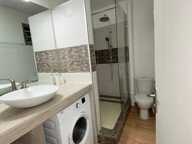 APPARTEMENT T2 MEUBLE  AU RDC AVEC JARDINET — photo 4