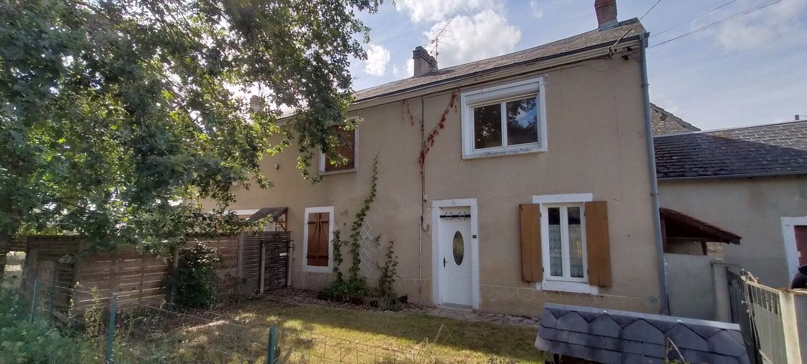 Ensemble immobilier comprenant 2 maisons, garage et jardin