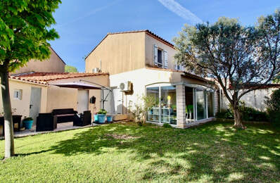 Marignane- Maison de type 4 d'une surface de  87m² avec terrasse, jardin et garage. — photo du bien