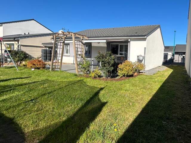 Maison de plain-pied 82 m² – 4 pièces – Jardin — photo du bien