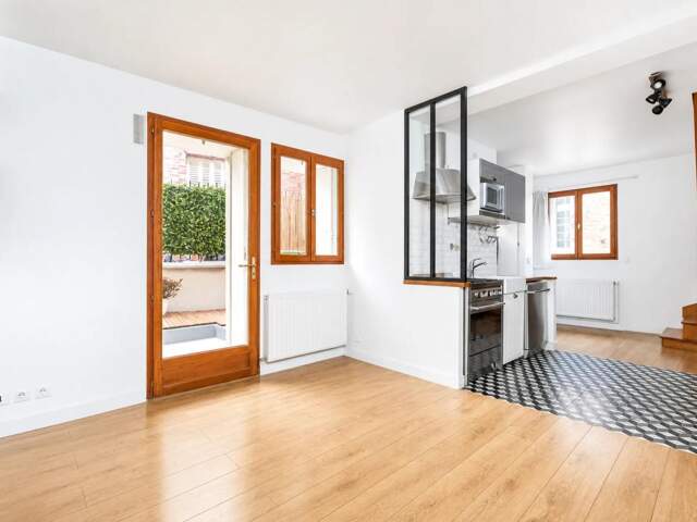 Maison 3 pièces de 53,3 m² à Paris — photo du bien