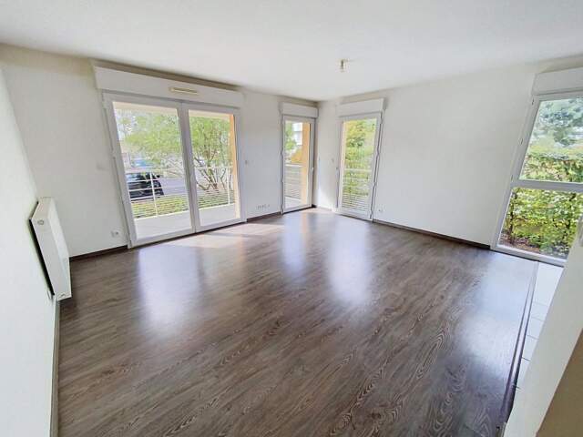 Appartement À Vendre avec parking en sous-sol — photo du bien