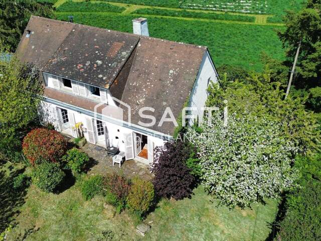 45 Minutes par A89 de Clermont-Ferrand.Au RC, Une chambre et salle de bain wc. maison de 5 pièces offre une surface habitable de 132 m². — photo du bien