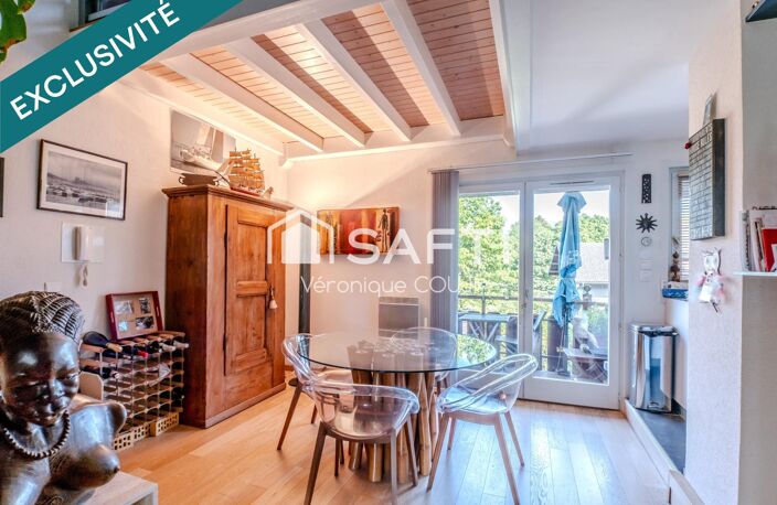 A Veigy-Foncenex (74140), duplex de charme aux beaux volumes avec piscine, à deux pas de la frontière. — photo 2