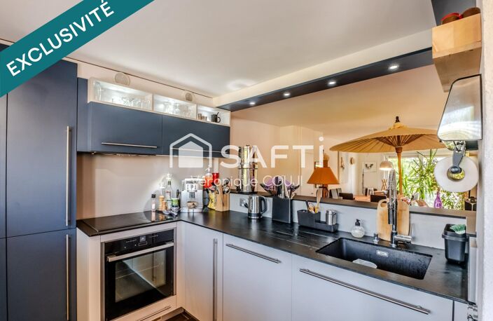 A Veigy-Foncenex (74140), duplex de charme aux beaux volumes avec piscine, à deux pas de la frontière. — photo 3