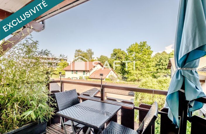 A Veigy-Foncenex (74140), duplex de charme aux beaux volumes avec piscine, à deux pas de la frontière. — photo 4