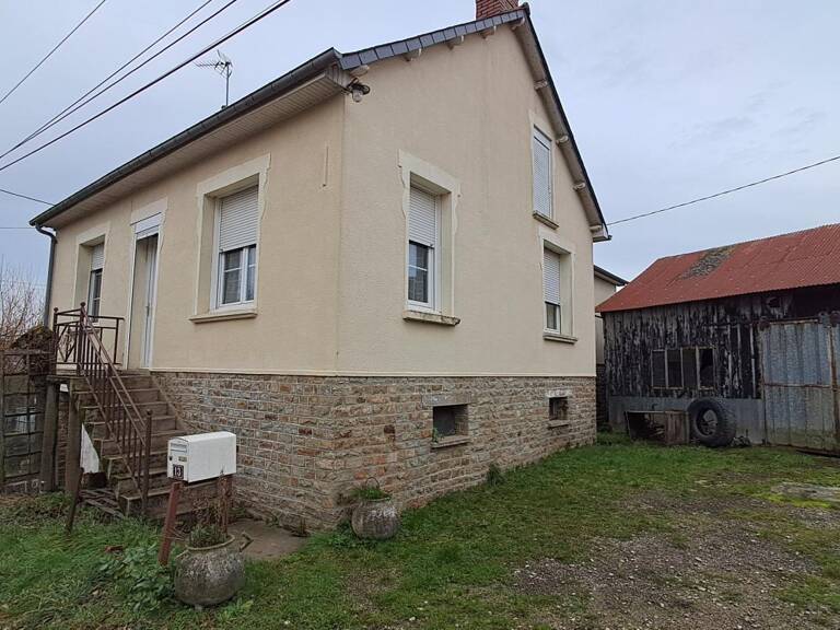 Maison et hangar — photo 1