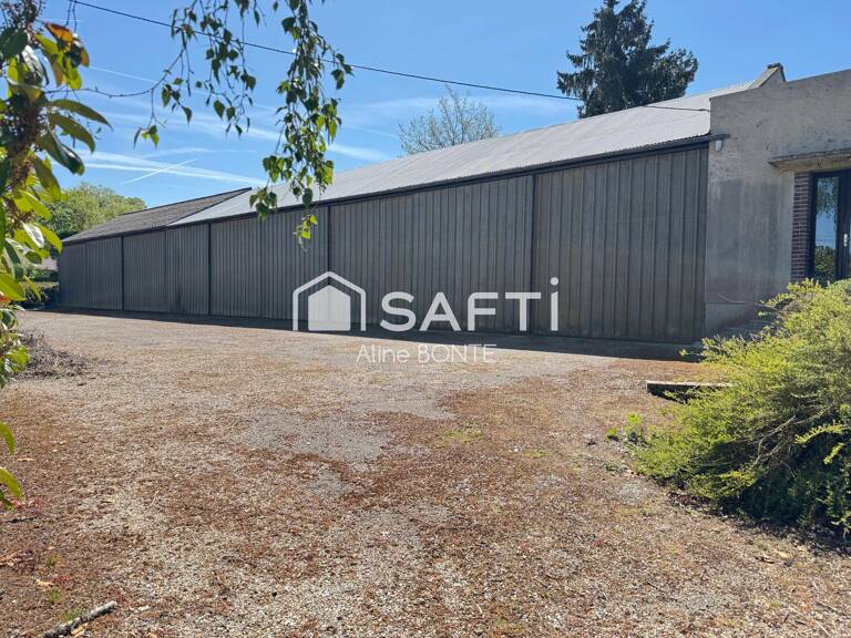 Maison sur sous-sol avec un hangar et un local — photo 1