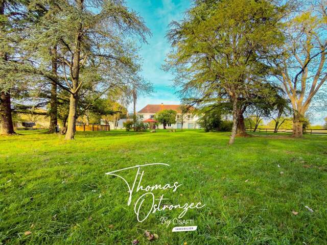 Demeure de charme 600m², 8 chambres sur 3 hectares — photo du bien