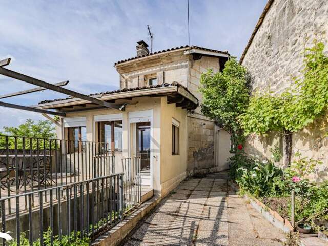 Maison en pierre de 5 pièces principales — photo du bien