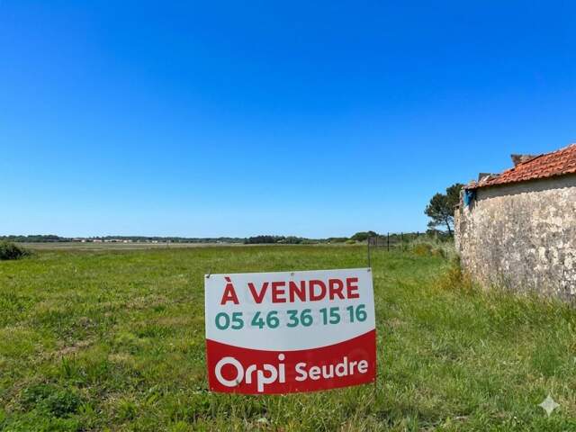 Terrain À Vendre non viabilisé de 665 m2 avec vue sur la plaine — photo du bien