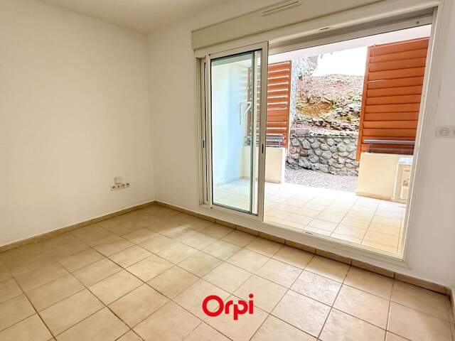 ORPI SAINTE CLOTILDE - T2 REZ-DE-JARDIN — photo du bien