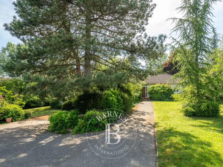 Saint-Didier-au-Mont-d'Or - Maison de plain-pied de 150 m² - 4/5 chambres - Terrain de 3403 m² — photo 1
