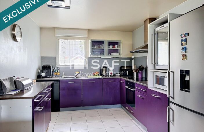 Maison 104 m², 4 chambres, garage et parking — photo 4