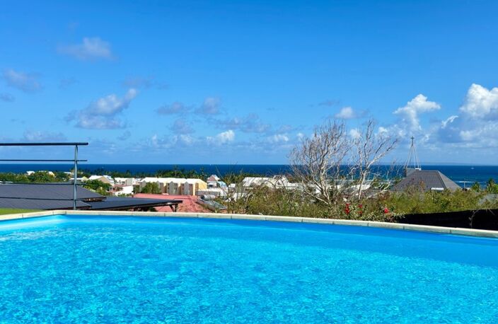 A VENDRE - PROPRIETE D'EXCEPTION AVEC VUE MER ET POTENTIEL LOCATIF REMARQUABLE - SAINTE ANNE — photo 3