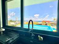 A VENDRE - PROPRIETE D'EXCEPTION AVEC VUE MER ET POTENTIEL LOCATIF REMARQUABLE - SAINTE ANNE — photo 4