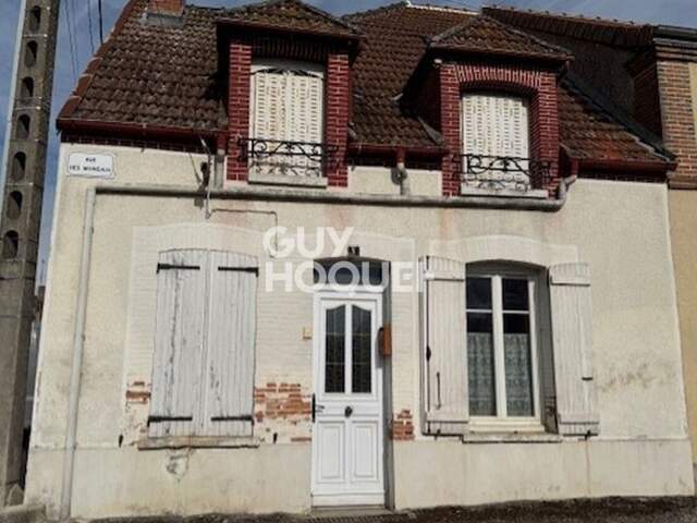 maison — photo du bien