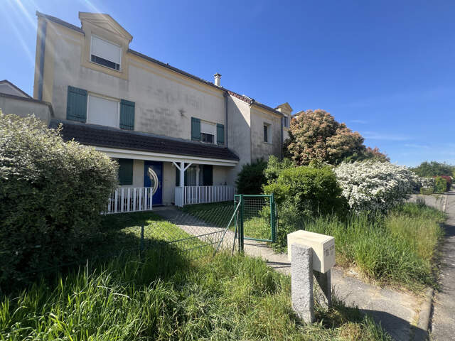 EN EXCLUSIVITÉ ! UN APPARTEMENT REZ-DE-JARDIN — photo du bien
