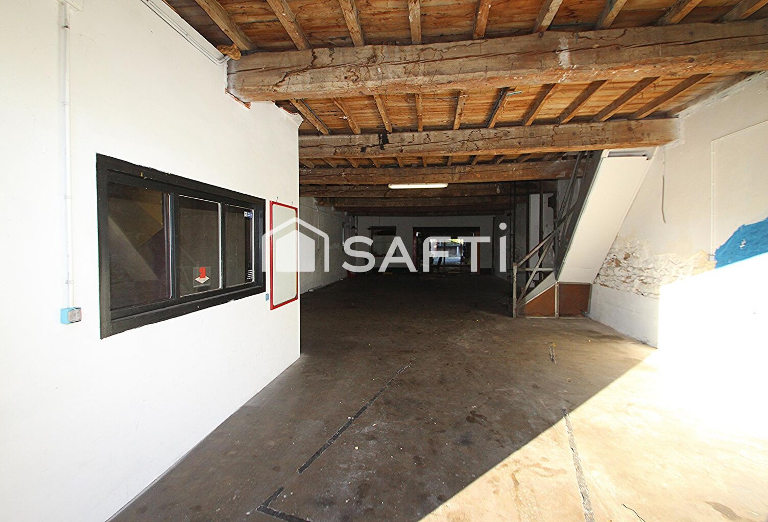Centre-ville : Garages et plusieurs niveaux — photo 1