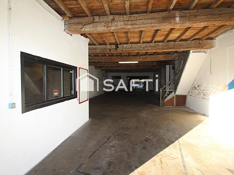 Centre-ville : Garages et plusieurs niveaux — photo 1