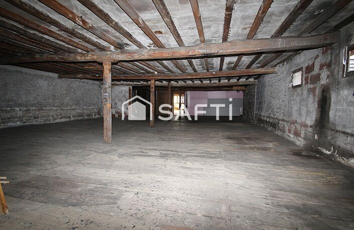 Centre-ville : Garages et plusieurs niveaux — photo 4